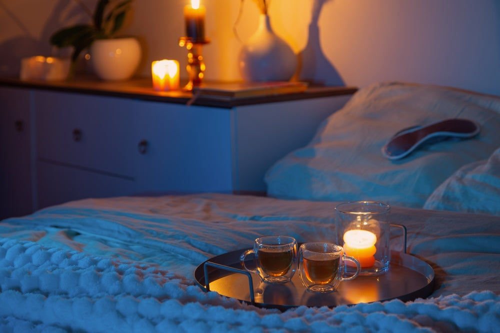 better sleep with cosmic hue - cup of cosmic hue tea in bedroom at night