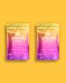 Two bags of Cosmic Hue side-by-side on a yellow gradient background